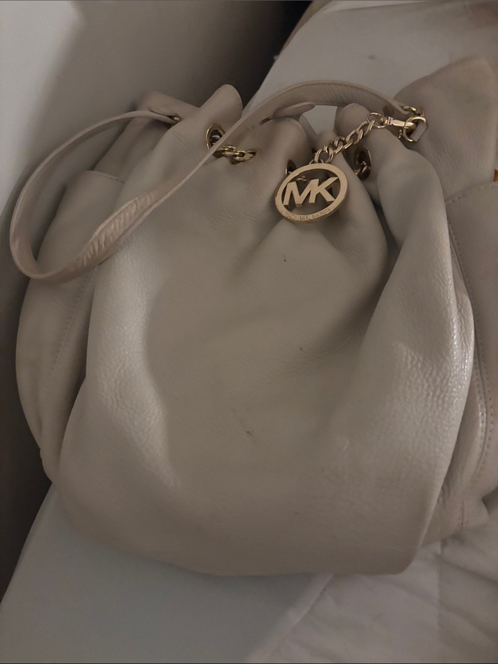 Michael Kors Cream Leather Drawstring Hobo with Gold MK Charm